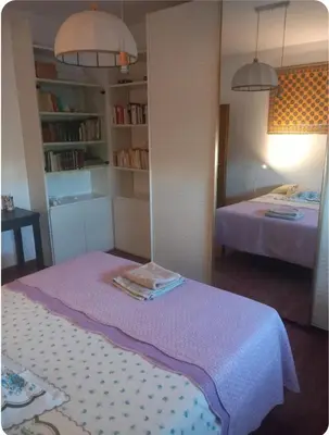Letto o letti in una camera di Casa Grossi