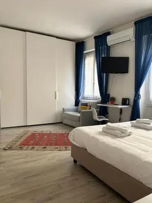 Letto o letti in una camera di Federica's Ponte Vecchio 1bd - by FlorenceHospitality