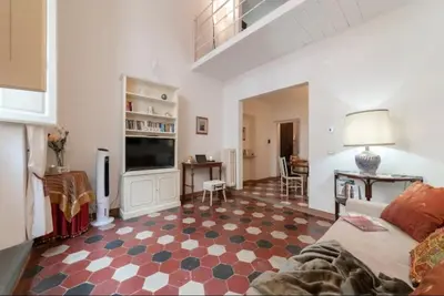 TV o dispositivi per l'intrattenimento presso Charming Loft Corso Italia