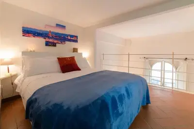 Letto o letti in una camera di Charming Loft Corso Italia