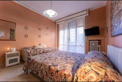 Letto o letti in una camera di Casa Bassotti