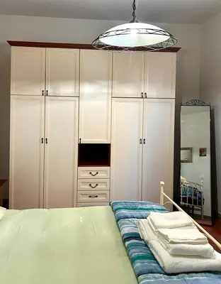 Letto o letti in una camera di Casa il Giglio