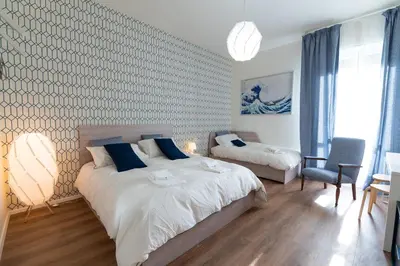 Letto o letti in una camera di SPOT4YOU Firenze, Italy - il posto giusto per te