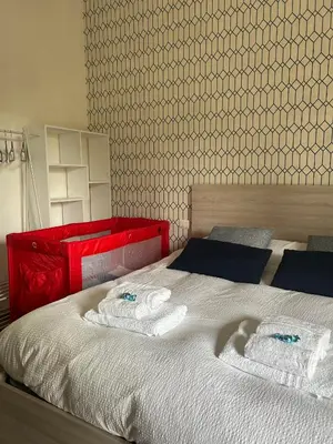 Letto o letti in una camera di SPOT4YOU Firenze, Italy - il posto giusto per te