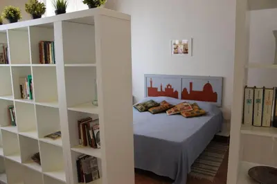 Letto o letti in una camera di Appartamento Pecan Firenze