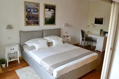Letto o letti in una camera di LE QUATTRO MURA EXCLUSIVE