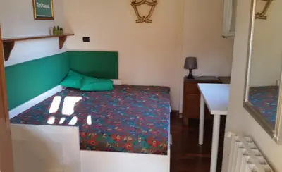 Letto o letti in una camera di My Sweet Home In S. Frediano