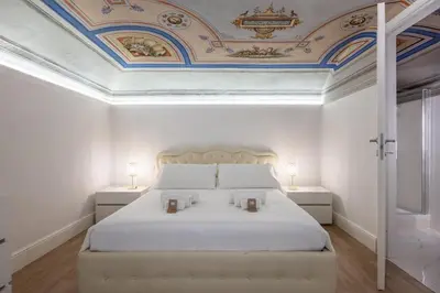 Letto o letti in una camera di The White House - Home of the Frescoes