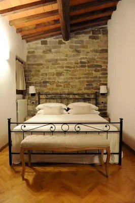 Letto o letti in una camera di ARIA DI CASA APARTMENT
