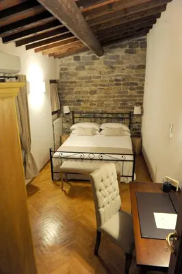 Letto o letti in una camera di ARIA DI CASA APARTMENT