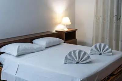 Letto o letti in una camera di Novoli Comfort Apartment Balcony & Tramvia