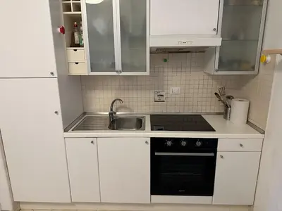 Cucina o angolo cottura di Appartamento a 7 minuti dalla stazione centrale