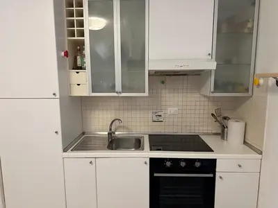 Cucina o angolo cottura di Appartamento a 7 minuti dalla stazione centrale