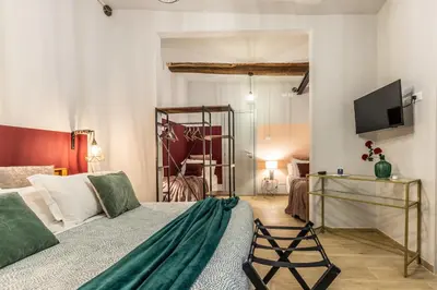 Letto o letti in una camera di Wine Apartments Florence Biancone