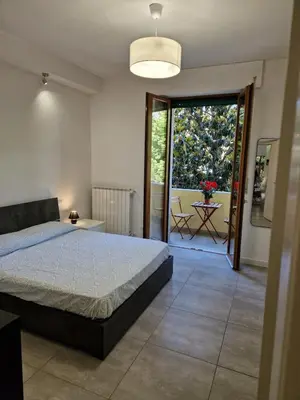 Letto o letti in una camera di Claudia San Donato Apartment