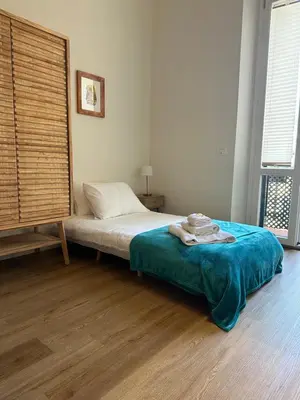 Letto o letti in una camera di Il Gelsomino Firenze