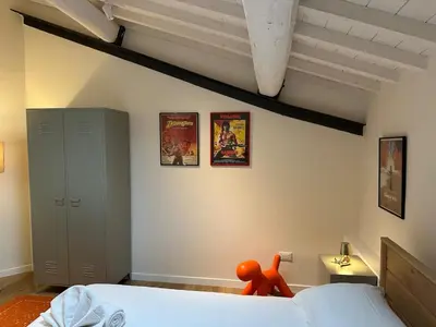 Letto o letti in una camera di La Piccionaia Firenze