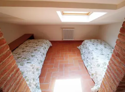 Letto o letti in una camera di Agriturismo GIOLE
