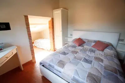Letto o letti in una camera di Agriturismo GIOLE