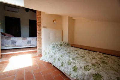 Letto o letti in una camera di Agriturismo GIOLE