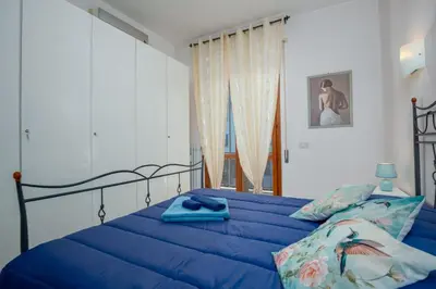Letto o letti in una camera di Bright home with large terrace, near Florence