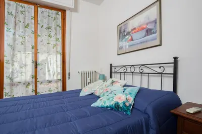 Letto o letti in una camera di Bright home with large terrace, near Florence