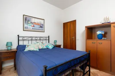 Letto o letti in una camera di Bright home with large terrace, near Florence