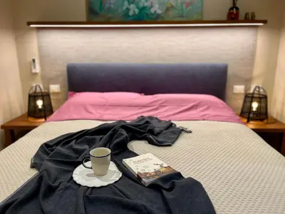 Letto o letti in una camera di La Porta Fiorentina - Luxury Apartment - Centro storico - 20 minuti da Firenze