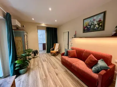 Area soggiorno di La Porta Fiorentina - Luxury Apartment - Centro storico - 20 minuti da Firenze