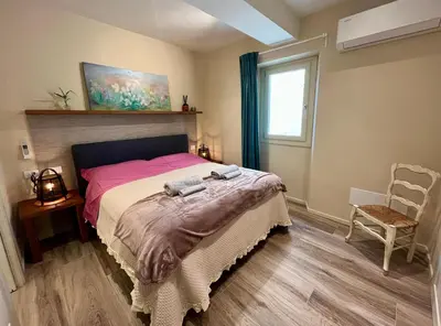 Letto o letti in una camera di La Porta Fiorentina - Luxury Apartment - Centro storico - 20 minuti da Firenze