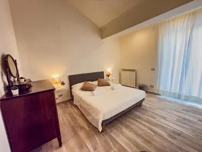 Letto o letti in una camera di Comfort Home Free Parking in Florence