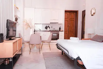 Letto o letti in una camera di La Perla Fiorentina