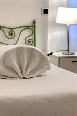Letto o letti in una camera di ZARINA green