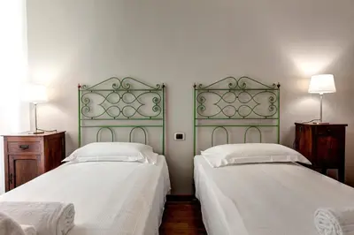 Letto o letti in una camera di ZARINA green