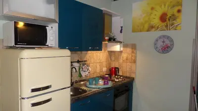 Cucina o angolo cottura di La Piccola Maison Firenze intera casa indipendente Careggi Rifredi