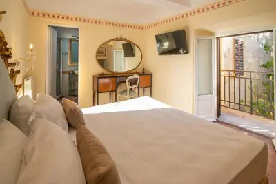 Letto o letti in una camera di Palazzo Guelfa Apt