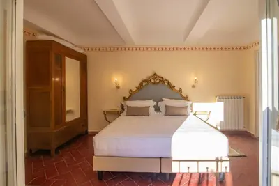 Letto o letti in una camera di Palazzo Guelfa Apt