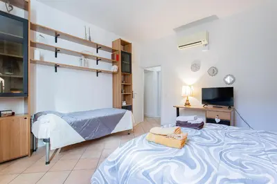 Letto o letti in una camera di I profumi del centro
