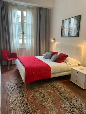 Letto o letti in una camera di Alfani 75 - Il cuore di Firenze