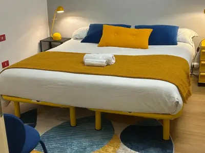 Letto o letti in una camera di Alfani 75 - Il cuore di Firenze