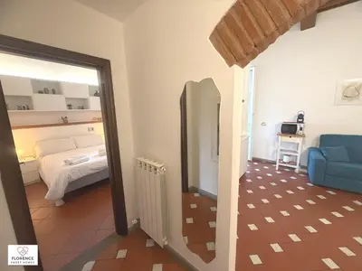 Letto o letti in una camera di Charming Terrace Apartment By Florence Sweet Homes
