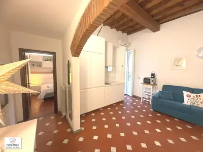 Letto o letti in una camera di Charming Terrace Apartment By Florence Sweet Homes