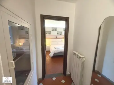Letto o letti in una camera di Charming Terrace Apartment By Florence Sweet Homes