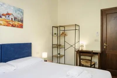 Letto o letti in una camera di Florence Slow-Life Flat in Oltrarno