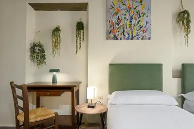 Letto o letti in una camera di Florence Slow-Life Flat in Oltrarno