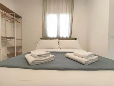 Letto o letti in una camera di Baracca Space Apartments
