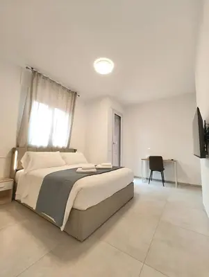 TV o dispositivi per l'intrattenimento presso Baracca Space Apartments