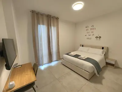 Letto o letti in una camera di Baracca Space Apartments