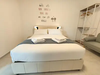 Letto o letti in una camera di Baracca Space Apartments