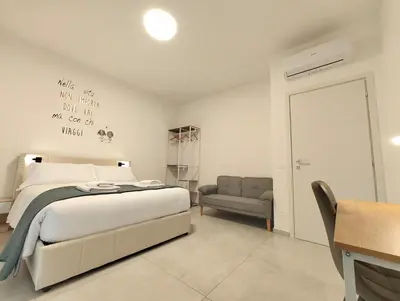 Letto o letti in una camera di Baracca Space Apartments